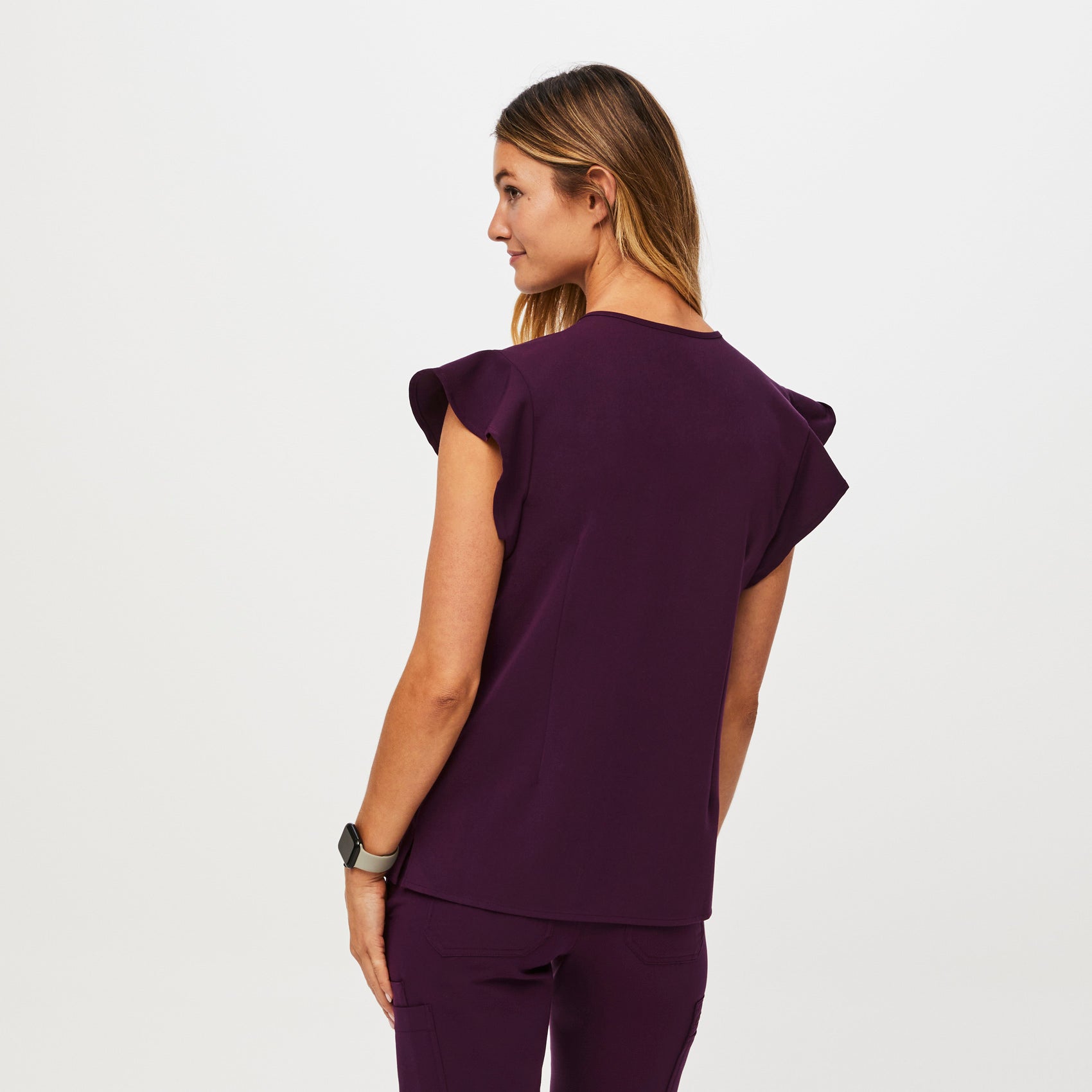 https://cdn.shopify.com/s/files/1/0139/8942/files/Q2_2023_06_DEEP-PURPLE_NATAL-FLUTTER-TOP_W_MADI_36403_7f2097a3-6103-48a3-939e-7e2c10fc0a0c.jpg?v=1690225314