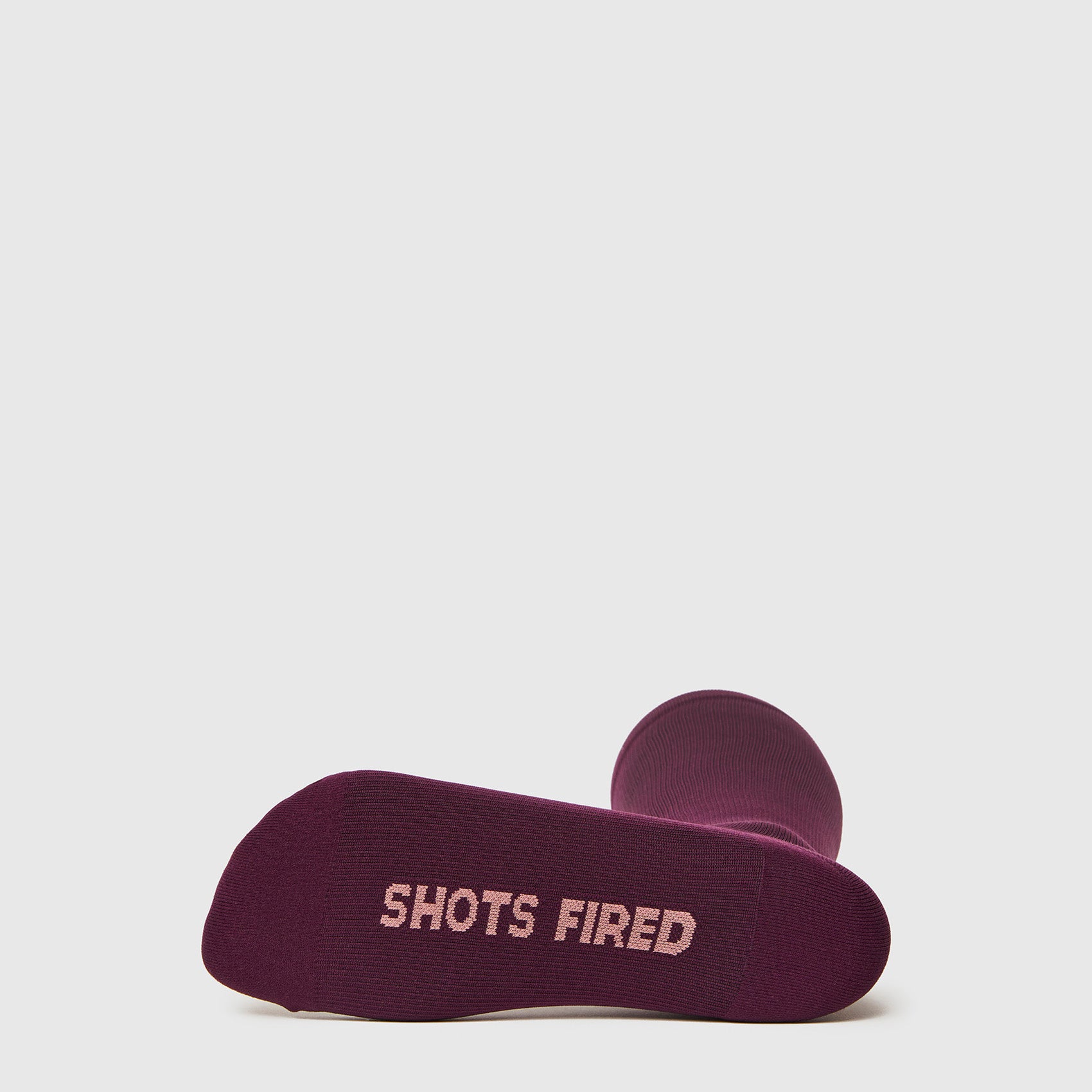 https://cdn.shopify.com/s/files/1/0139/8942/files/Q2_2023_06_DEEP-PURPLE_SHOTS-FIRED-COMPRESSION-SOCKS_W_GHOST_26827.jpg?v=1690233425