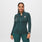 https://cdn.shopify.com/s/files/1/0139/8942/files/Q2_2023_06_HEATHERED-DARK-CARIBBEAN-BLUE_SALTA-SEAMLESS-FULL-ZIP_W_SALOME_28384.jpg?v=1689700477