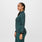https://cdn.shopify.com/s/files/1/0139/8942/files/Q2_2023_06_HEATHERED-DARK-CARIBBEAN-BLUE_SALTA-SEAMLESS-FULL-ZIP_W_SALOME_28414.jpg?v=1689700476