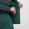 https://cdn.shopify.com/s/files/1/0139/8942/files/Q2_2023_06_HEATHERED-DARK-CARIBBEAN-BLUE_SALTA-SEAMLESS-FULL-ZIP_W_SALOME_28437.jpg?v=1689700476