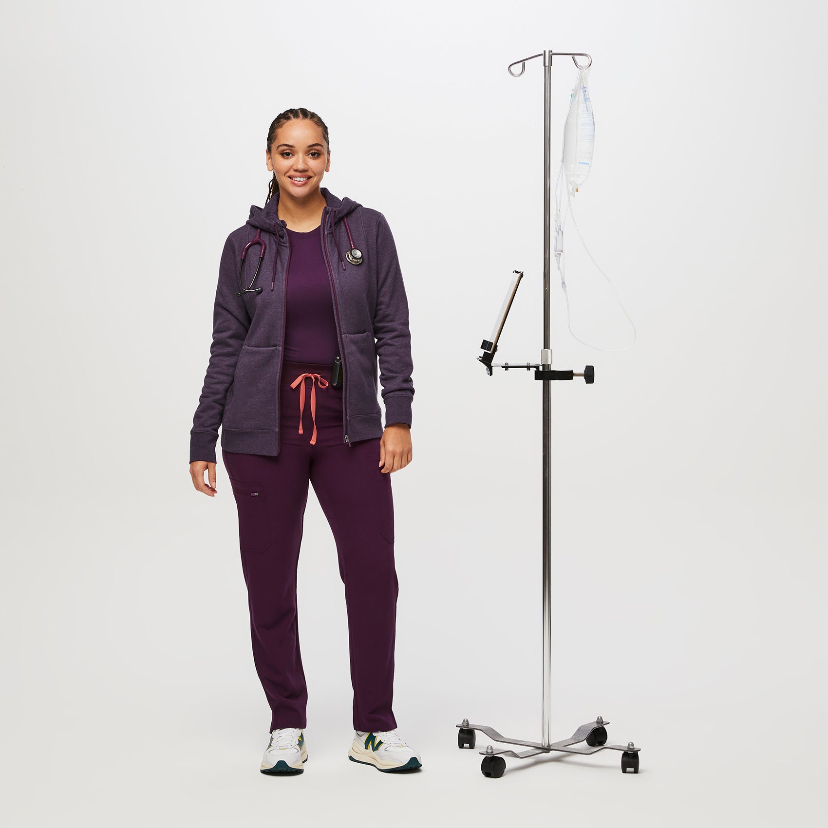 https://cdn.shopify.com/s/files/1/0139/8942/files/Q2_2023_06_HEATHERED-DEEP-PURPLE_ON-SHIFT-FULL-ZIP-HOODIE_W_SALOME_28647.jpg?v=1690234093