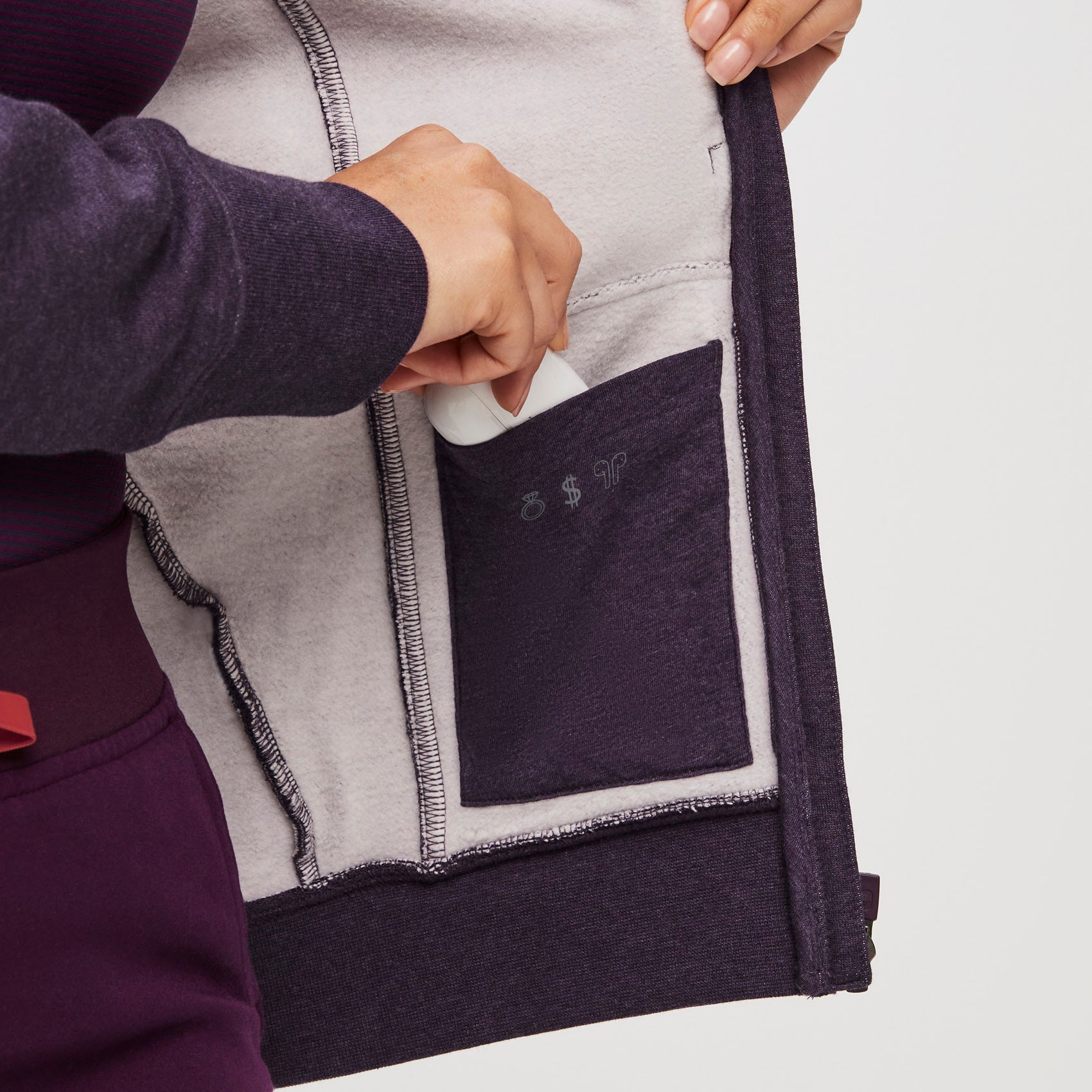 https://cdn.shopify.com/s/files/1/0139/8942/files/Q2_2023_06_HEATHERED-DEEP-PURPLE_ON-SHIFT-FULL-ZIP-HOODIE_W_SALOME_28725.jpg?v=1690234073