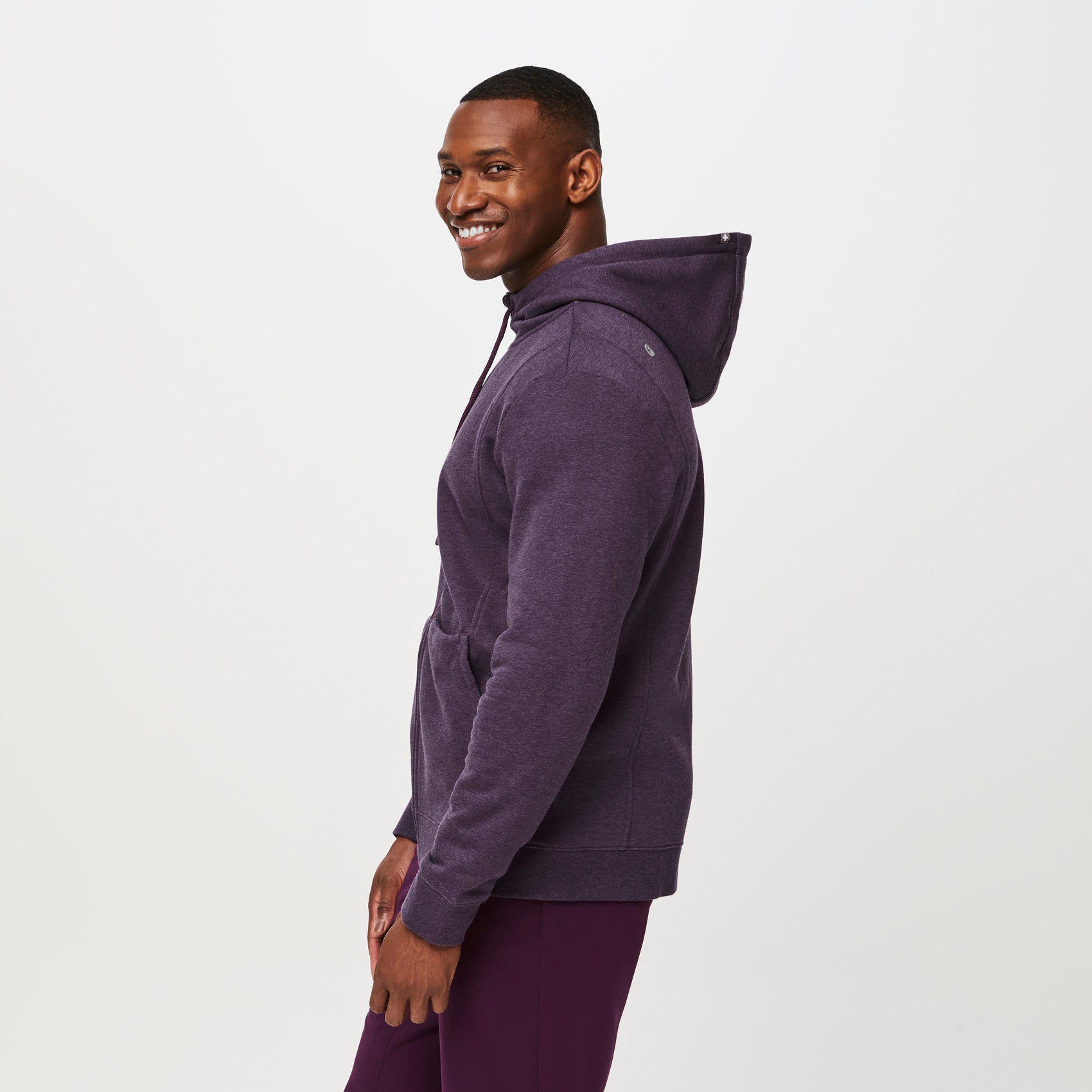https://cdn.shopify.com/s/files/1/0139/8942/files/Q2_2023_06_HEATHERED-DEEP-PURPLE_OS-FULL-ZIP-HOODIE_M_TERRANCE_35685.jpg?v=1690220545
