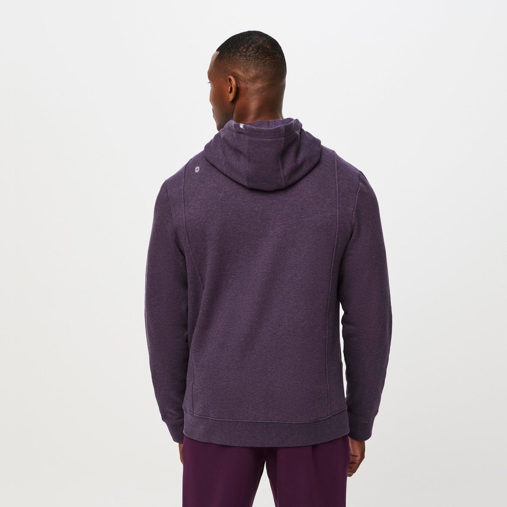 https://cdn.shopify.com/s/files/1/0139/8942/files/Q2_2023_06_HEATHERED-DEEP-PURPLE_OS-FULL-ZIP-HOODIE_M_TERRANCE_35688.jpg?v=1690220545