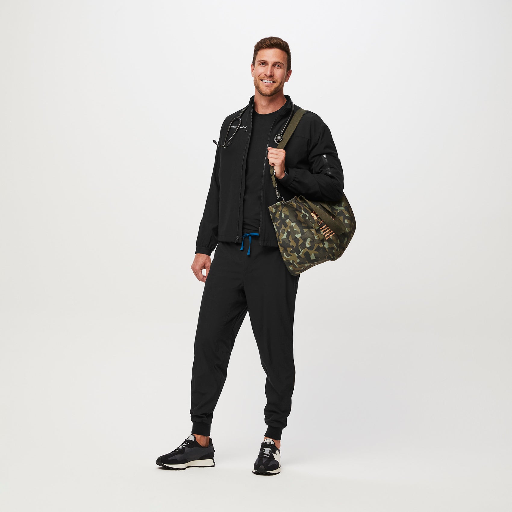 https://cdn.shopify.com/s/files/1/0139/8942/files/Q2_2023_06_MARTINI-OLIVE-CAMO-CANVAS-ZIPPER-TOTE_U_COREY_34677.jpg?v=1691604784