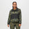 https://cdn.shopify.com/s/files/1/0139/8942/files/Q2_2023_06_MARTINI-OLIVE-CAMO_PRINTED-FREEX-CRAIGHILL-SCRUB-JACKET_W_SALOME_27397.jpg?v=1693355821
