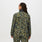 https://cdn.shopify.com/s/files/1/0139/8942/files/Q2_2023_06_MARTINI-OLIVE-CAMO_PRINTED-FREEX-CRAIGHILL-SCRUB-JACKET_W_SALOME_27408.jpg?v=1693355821