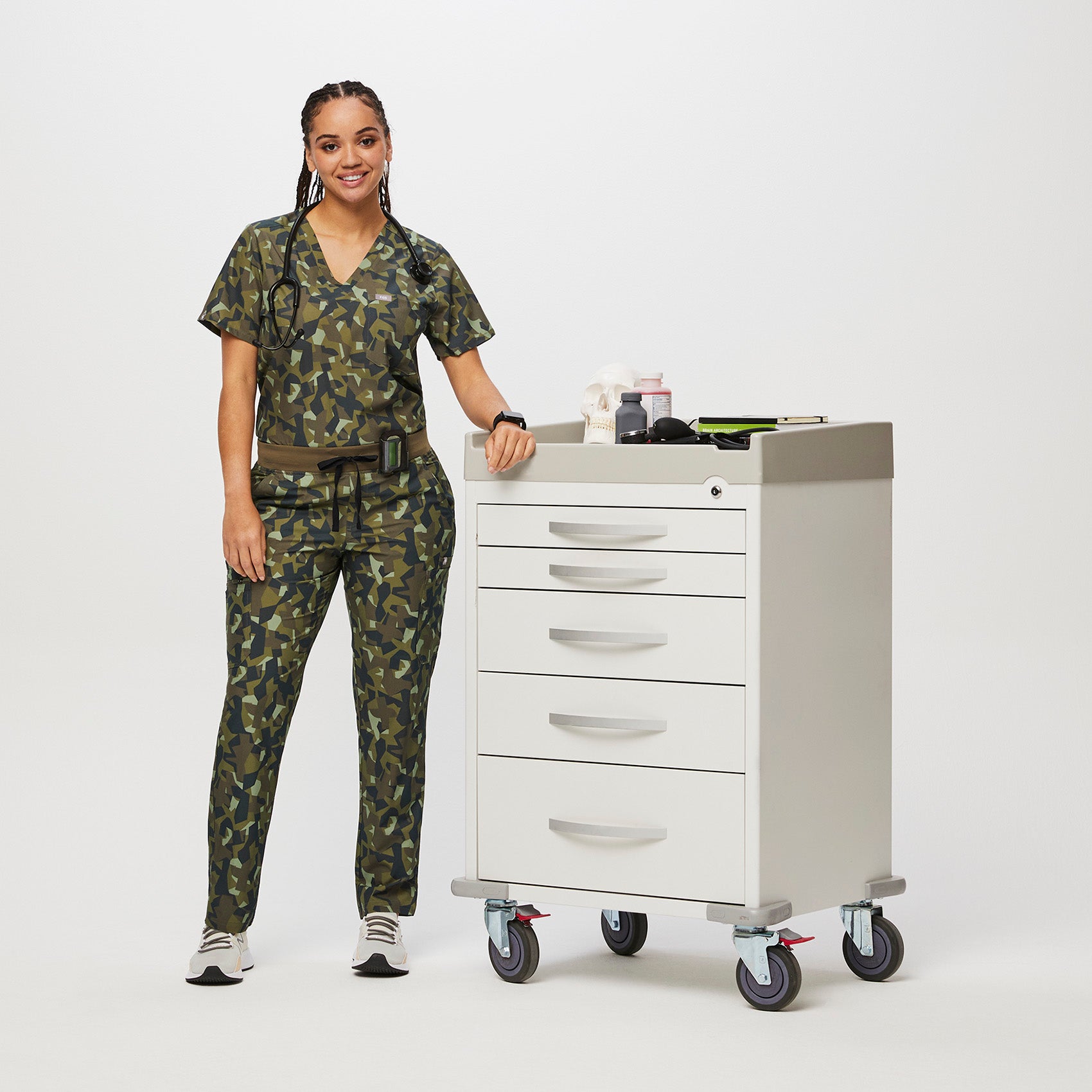 https://cdn.shopify.com/s/files/1/0139/8942/files/Q2_2023_06_MARTINI-OLIVE-CAMO_PRINTED-FREEX-YOLA_W_SALOME_27512_52c39a30-9871-4517-905f-ebcf188923ee.jpg?v=1691615304