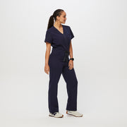 https://cdn.shopify.com/s/files/1/0139/8942/files/Q2_2023_06_NAVY_CATARINA-SCRUB-JUMPSUIT_W_SALOME_28482.jpg?v=1689701275