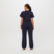 https://cdn.shopify.com/s/files/1/0139/8942/files/Q2_2023_06_NAVY_CATARINA-SCRUB-JUMPSUIT_W_SALOME_28499.jpg?v=1689701275