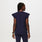 https://cdn.shopify.com/s/files/1/0139/8942/files/Q2_2023_06_NAVY_NATAL-FLUTTER-SLEEVE_W_AWA_32486.jpg?v=1690225343