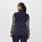 https://cdn.shopify.com/s/files/1/0139/8942/files/Q2_2023_06_NAVY_OS-FLEECE-VEST_W_SALOME_29273.jpg?v=1692134480
