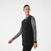 https://cdn.shopify.com/s/files/1/0139/8942/files/Q2_2024_4_BLACK_SCRUBSMOCKTOP_MADI_1732_c.jpg?v=1715198502