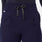 https://cdn.shopify.com/s/files/1/0139/8942/files/Q2_2024_4_NAVY_LILLIEHIGHWAISTEDSLIMTAPEREDSCRUBPANT_MELANIE1719_1e8a9042-b171-48ef-a905-d6cfdfb7bae5.jpg?v=1714153408