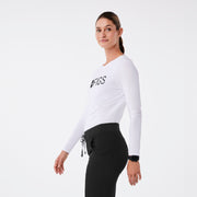 https://cdn.shopify.com/s/files/1/0139/8942/files/Q2_2024_4_WHITE_FIGSLOGOSUPERSOFTLS_MADI_1551_c.jpg?v=1716935497