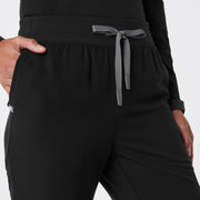 https://cdn.shopify.com/s/files/1/0139/8942/files/Q2_2024_5_BLACK_HWCORDOVAFLARESCRUBPANT_CHARO_1266_707ff053-24a3-41e2-bcaa-e9c1251001b4.jpg?v=1718127993