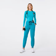 https://cdn.shopify.com/s/files/1/0139/8942/files/Q2_2024_5_TEAL_HWUMANJOGGER_NATALIE_631.jpg?v=1736360179