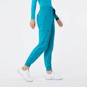 https://cdn.shopify.com/s/files/1/0139/8942/files/Q2_2024_5_TEAL_HWUMANJOGGER_NATALIE_680.jpg?v=1736359415