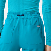 https://cdn.shopify.com/s/files/1/0139/8942/files/Q2_2024_5_TEAL_HWUMANJOGGER_NATALIE_689.jpg?v=1736359415