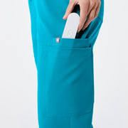 https://cdn.shopify.com/s/files/1/0139/8942/files/Q2_2024_5_TEAL_HWUMANJOGGER_NATALIE_697.jpg?v=1736359415