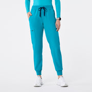 https://cdn.shopify.com/s/files/1/0139/8942/files/Q2_2024_5_TEAL_UMANJOGGER_NATALIE_750.jpg?v=1736360996