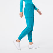 https://cdn.shopify.com/s/files/1/0139/8942/files/Q2_2024_5_TEAL_UMANJOGGER_NATALIE_755.jpg?v=1736361008