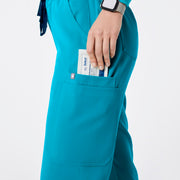 https://cdn.shopify.com/s/files/1/0139/8942/files/Q2_2024_5_TEAL_UMANJOGGER_NATALIE_800.jpg?v=1736361001