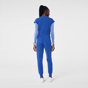 https://cdn.shopify.com/s/files/1/0139/8942/files/Q2_2024_5_WINNINGBLU_V-NECKJOGGERSCRUBJUMPSUIT_AWA_1681.jpg?v=1720570810