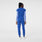 https://cdn.shopify.com/s/files/1/0139/8942/files/Q2_2024_5_WINNINGBLU_V-NECKJOGGERSCRUBJUMPSUIT_AWA_1681.jpg?v=1720570810