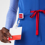 https://cdn.shopify.com/s/files/1/0139/8942/files/Q2_2024_5_WINNINGBLU_V-NECKJOGGERSCRUBJUMPSUIT_AWA_1701.jpg?v=1720570811
