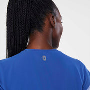 https://cdn.shopify.com/s/files/1/0139/8942/files/Q2_2024_5_WINNINGBLU_V-NECKJOGGERSCRUBJUMPSUIT_AWA_1710.jpg?v=1720570810