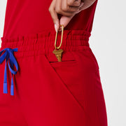 https://cdn.shopify.com/s/files/1/0139/8942/files/Q2_2024_5_WINNINGRED_HWREGINASCRUBJOGGER_DEJA_1203_new_12fb0c4f-5e5c-4aa0-93a2-fb19de5c81e6.jpg?v=1721260106