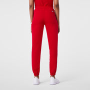 https://cdn.shopify.com/s/files/1/0139/8942/files/Q2_2024_5_WINNINGRED_HWREGINASCRUBJOGGER_DEJA_1220_4b93a7f6-6d44-45a7-bd28-74f34d724d4e.jpg?v=1720549210