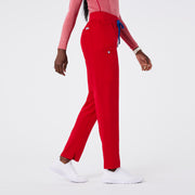 https://cdn.shopify.com/s/files/1/0139/8942/files/Q2_2024_5_WINNINGRED_MAYFAIRSKINNYSCRUBPANT_AWA_1869_fe9a49d8-b8fd-462c-be60-dd11c51f5c6a.jpg?v=1720549330