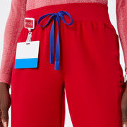 https://cdn.shopify.com/s/files/1/0139/8942/files/Q2_2024_5_WINNINGRED_MAYFAIRSKINNYSCRUBPANT_AWA_1896_f7be5bcc-b066-422b-bb47-75b41867bf3b.jpg?v=1720549330