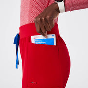 https://cdn.shopify.com/s/files/1/0139/8942/files/Q2_2024_5_WINNINGRED_MAYFAIRSKINNYSCRUBPANT_AWA_1920_d9b65331-2149-42ca-9b28-e45ade381d7c.jpg?v=1720549330