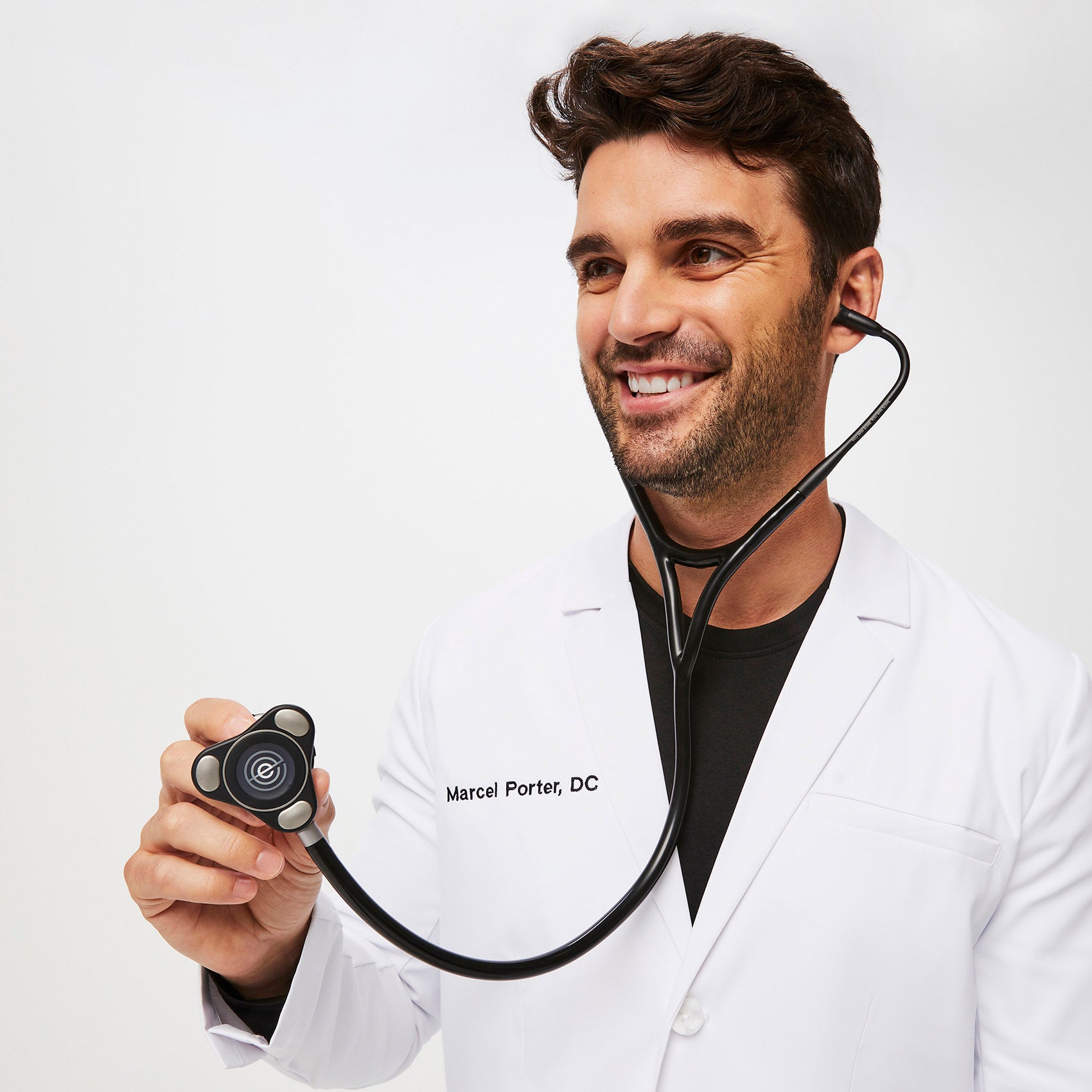 https://cdn.shopify.com/s/files/1/0139/8942/files/Q3_2023_07_BLACK_EKO-STETHOSCOPE_M_RYAN_08823_e8aa9379-f105-4227-b582-f66824bd1a40.jpg?v=1693262368