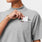 https://cdn.shopify.com/s/files/1/0139/8942/files/Q3_2023_07_HEATHERED-GREY_PRO-PIQUE-MOCK-NECK-SCRUBPOLO_W_LOGAN_10497.jpg?v=1692207709