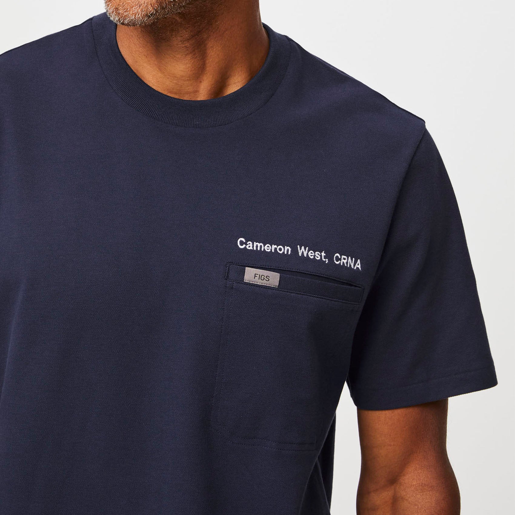 https://cdn.shopify.com/s/files/1/0139/8942/files/Q3_2023_07_NAVY_PRO-MOCK-NECK-SS_TOP_M_RICHARD_11988.jpg?v=1692833343