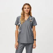 Blusa de uniforme médico con tres bolsillos para mujer