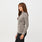 https://cdn.shopify.com/s/files/1/0139/8942/files/Q3_2023_08_HEATHERED-CACAO_SALTA-FULL_ZIP_W_MELANIE_17477.jpg?v=1695688939