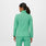 https://cdn.shopify.com/s/files/1/0139/8942/files/Q3_2023_08_SURGICAL-GREEN_OS-FLEECE-JACKET_W_ALYSSAH_15586.jpg?v=1700070732
