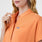 https://cdn.shopify.com/s/files/1/0139/8942/files/Q3_2024_7_SHAKAORANGE_MONTEXSCRUBTOP_CLARA_172.jpg?v=1723238186