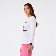 https://cdn.shopify.com/s/files/1/0139/8942/files/Q3_2024_7_WHITE_LSGRAPHICTEE_CHARO_1378.jpg?v=1727203411