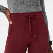 https://cdn.shopify.com/s/files/1/0139/8942/files/Q3_2024_8_BURGUNDY_SEVILLESKINNYSCRUBLEGGING_AWA_4422.jpg?v=1727733120