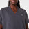 https://cdn.shopify.com/s/files/1/0139/8942/files/Q3_2024_8_CHARCOAL_HALLEV-NECKTUNICSCRUBTOP_AWA_221.jpg?v=1727733083