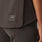 https://cdn.shopify.com/s/files/1/0139/8942/files/Q4_2023_10_DARK-BROWN_BO-KATAN-PLEATED-SCRUB-TOP_W_MADI_03021.jpg?v=1698686996