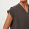 https://cdn.shopify.com/s/files/1/0139/8942/files/Q4_2023_10_DARK-BROWN_BO-KATAN-PLEATED-SCRUB-TOP_W_MADI_03044.jpg?v=1698686996
