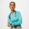 https://cdn.shopify.com/s/files/1/0139/8942/files/Q4_2023_10_HEATHERED-DJARIN-BLUE_JAWA-LS-UNDERSCRUB_W_CHARO_09107.jpg?v=1698688707